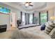 Bedroom featuring a ceiling fan, trey ceiling, two windows, and a vanity at 2025 Maybelles Ln, Charleston, SC 29414