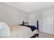 Bedroom with neutral color walls, a black wood bed and closet and door at 2025 Maybelles Ln, Charleston, SC 29414