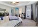 Bedroom featuring a ceiling fan, trey ceiling, two windows, and a vanity at 2025 Maybelles Ln, Charleston, SC 29414