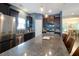 Modern kitchen featuring stainless steel appliances, granite countertops, and a central island with seating at 2025 Maybelles Ln, Charleston, SC 29414