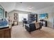 Spacious home office with sports memorabilia, TV, large window, and comfortable seating at 2025 Maybelles Ln, Charleston, SC 29414