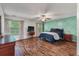 Spacious primary bedroom with hardwood floors and ceiling fan at 206 Hawkridge Pl, Goose Creek, SC 29445