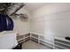 Organized walk-in closet features built-in shelving and ample storage space at 2141 Sandy Point Ln, Mount Pleasant, SC 29466