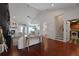 Bright and airy living area with wood floors, an open layout, and easy access to other rooms at 2141 Sandy Point Ln, Mount Pleasant, SC 29466