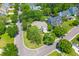 An aerial view of a beautiful suburban home nestled among mature trees and well-manicured lawns at 2184 Tall Grass Cir, Mount Pleasant, SC 29466