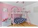 Charming pink bedroom with whimsical decor and a cozy bunk bed at 2184 Tall Grass Cir, Mount Pleasant, SC 29466