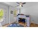 Bright bedroom with a loft bed, ceiling fan, and access to a private balcony at 2184 Tall Grass Cir, Mount Pleasant, SC 29466