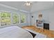 Bright main bedroom featuring a bookshelf, hardwood floors, and lots of natural light at 2184 Tall Grass Cir, Mount Pleasant, SC 29466