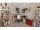 Functional home office with built-in bookshelves, a work desk, and ample storage space at 2184 Tall Grass Cir, Mount Pleasant, SC 29466