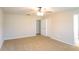 Bright and airy bedroom featuring a ceiling fan, neutral walls, and carpet flooring at 241 Wathen Dr, Goose Creek, SC 29445