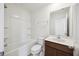 Bright bathroom featuring a sink with marble countertop, toilet, and tub at 278 Catawba Branch Way, Moncks Corner, SC 29461