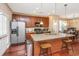 Open concept kitchen featuring stainless steel appliances, granite countertops, and a breakfast bar with seating at 286 Chemistry Cir, Ladson, SC 29456