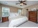 Bright bedroom with natural light features neutral walls, carpet floors, and a large dresser at 286 Chemistry Cir, Ladson, SC 29456