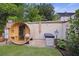 Backyard featuring barrel sauna, outdoor shower, and hot tub in a serene setting at 29 Bogard St, Charleston, SC 29403