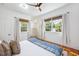 Bright bedroom with natural light, hardwood floors, and stylish decor at 29 Bogard St, Charleston, SC 29403