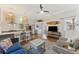 Bright living room with hardwood floors, ceiling fan, and stylish decor throughout the home at 29 Bogard St, Charleston, SC 29403