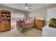 Bedroom featuring pink curtains, comfortable bed and matching furniture at 30 Regency Oaks Dr, Summerville, SC 29485