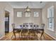 Elegant dining room featuring a stylish light fixture and a table with seating for eight at 30 Regency Oaks Dr, Summerville, SC 29485