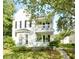 Beautiful two-story home with double balconies and a welcoming turquoise front door at 30 Regency Oaks Dr, Summerville, SC 29485