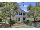 Beautiful two-story home with double balconies, manicured landscaping, and a welcoming front porch at 30 Regency Oaks Dr, Summerville, SC 29485