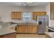 Functional kitchen with stainless steel appliances, tile flooring, and ample cabinet space at 30 Regency Oaks Dr, Summerville, SC 29485