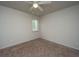 Bright bedroom featuring neutral walls, carpet flooring, a ceiling fan, and a window for natural light at 306 Crestview Dr # C, Summerville, SC 29485