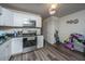 Bright kitchen with stainless appliances, ample counter space, and convenient storage at 306 Crestview Dr # C, Summerville, SC 29485
