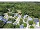 Aerial view of neighborhood featuring mature trees and well-maintained homes at 3073 Penny Ln, Johns Island, SC 29455