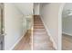 Inviting foyer boasts beautiful floors and a staircase leading to the upper level at 3073 Penny Ln, Johns Island, SC 29455