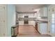 Modern kitchen featuring stainless steel appliances, granite countertops, and white cabinets at 3073 Penny Ln, Johns Island, SC 29455
