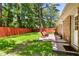 Fenced backyard with patio at 315 Elliott Dr, Ladson, SC 29456