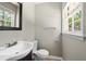 Powder room with large window and pedestal sink at 315 Elliott Dr, Ladson, SC 29456