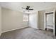 Bedroom with carpet flooring, ceiling fan, and closet at 315 Elliott Dr, Ladson, SC 29456