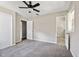 Bedroom with carpet flooring, ceiling fan, and bathroom at 315 Elliott Dr, Ladson, SC 29456