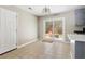 Kitchen with an island and sliding glass door that provides access to an outdoor seating area at 315 Elliott Dr, Ladson, SC 29456