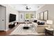 Cozy living room with neutral palette, modern furnishings, and large windows offering natural light at 315 Elliott Dr, Ladson, SC 29456
