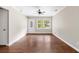Spacious living room with hardwood floors, a ceiling fan, and a bright window view at 315 Elliott Dr, Ladson, SC 29456