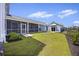 Well-maintained backyard featuring a landscaped lawn and patio space at 318 Ripple Park Dr, Summerville, SC 29486