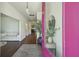Bright foyer with dark wood floors, a modern mirror, and plants that add a touch of nature at 318 Ripple Park Dr, Summerville, SC 29486