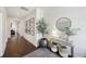 Inviting foyer with wood floors, decorative table, and a stylish round mirror to welcome guests at 318 Ripple Park Dr, Summerville, SC 29486