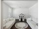 Play room featuring white sofas and an alphabet rug for learning, perfect for Gathering time at 318 Ripple Park Dr, Summerville, SC 29486