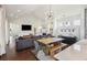 Bright and open living space featuring hardwood floors, modern decor, and a seamless flow between living areas at 318 Ripple Park Dr, Summerville, SC 29486