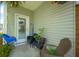 Cozy back porch with outdoor seating and plants creating a relaxing outdoor space at 326 Surfbird Rd # 388, Summerville, SC 29486