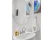 Clean bathroom with a modern sink, round mirror, and decorative accents on the wall at 326 Surfbird Rd # 388, Summerville, SC 29486