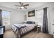 Cozy bedroom features a ceiling fan, large windows and carpeted floors creating a relaxing atmosphere at 326 Surfbird Rd # 388, Summerville, SC 29486