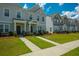 A row of well-maintained townhouses with green lawns and inviting front entrances at 326 Surfbird Rd # 388, Summerville, SC 29486