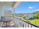 Charming balcony with views of the street and neighborhood, perfect for outdoor relaxation at 3751 Copahee Sound Dr, Mount Pleasant, SC 29466