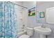 Bright bathroom featuring a tub, shower, vanity, and tropical-themed decor at 3751 Copahee Sound Dr, Mount Pleasant, SC 29466