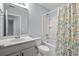 Bright bathroom with a single vanity and a shower/tub combo with decorative shower curtain at 3751 Copahee Sound Dr, Mount Pleasant, SC 29466
