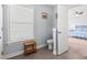 Cozy bathroom with a window, toilet, and tile flooring adjacent to a comfortable bedroom at 3751 Copahee Sound Dr, Mount Pleasant, SC 29466